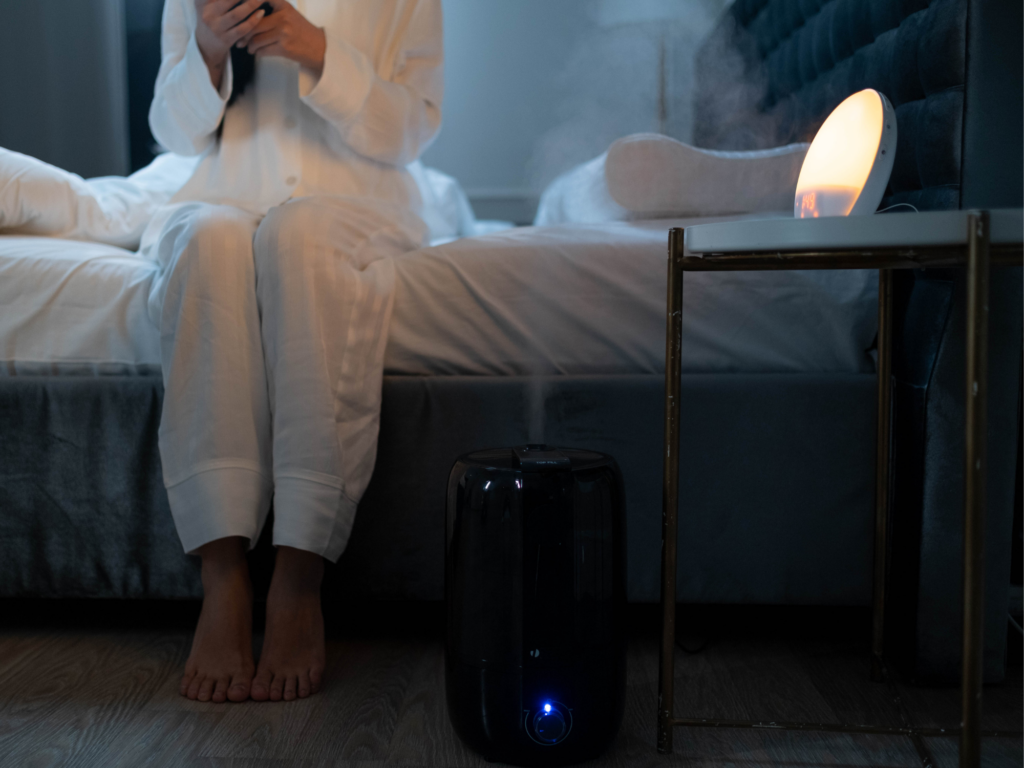 cool mist humidifier in bedroom to prevent morning throat pain from dry air