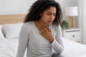why does my throat hurt when i wake up