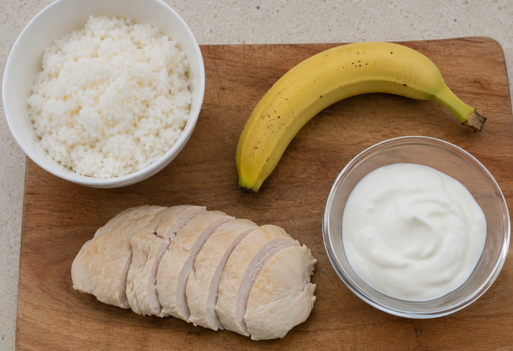 Gastritis-friendly foods that help manage gastritis symptoms including rice banana chicken and yogurt